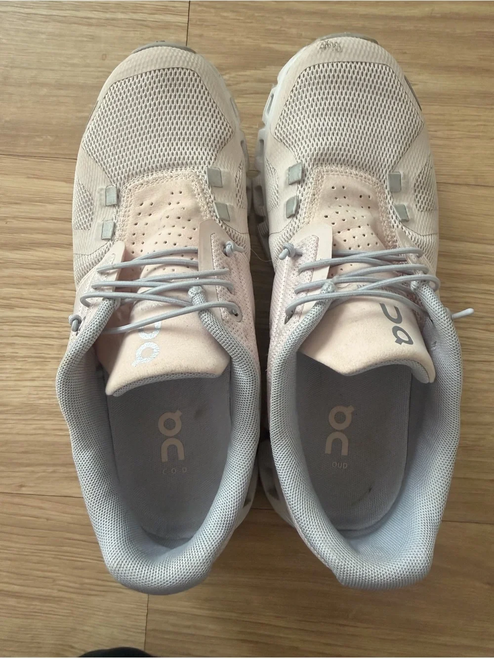 On Running woman’s Athletic Shoes in Pale Pink and Light Gray